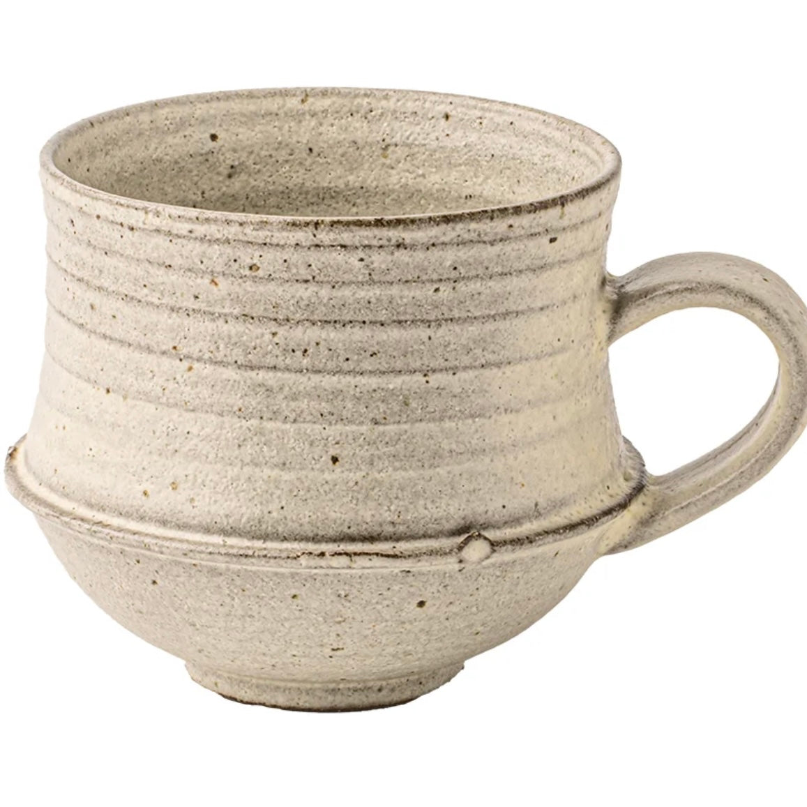 Beige ceramic mug with a textured surface on a white background