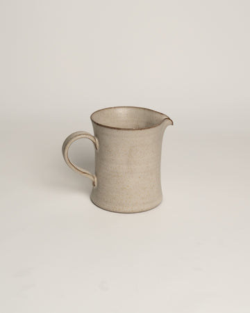 Lunar Sand ceramic creamer pitcher with loop handle and pouring spout